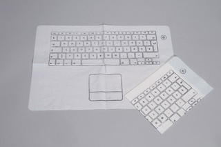 Illustration for article titled Ridiculous Keyboard Napkin Crumb-Proofs Your Laptop